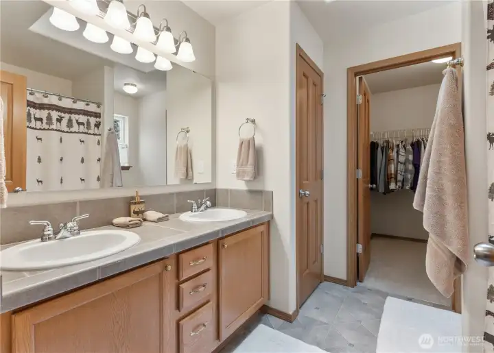 Large primary bedroom offers a large walk-in closet off the bath!