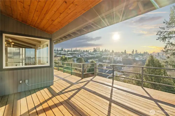 At the end of the day, enjoy sunsets fill the sky with color. Custom outdoor power blinds also protect from too much sun