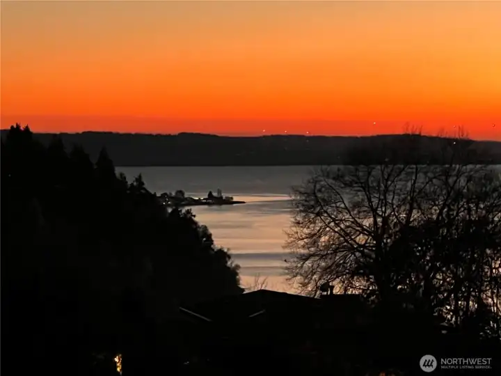 This breathtaking Puget Sound sunset captures the essence of Northwest living—expansive water views, the silhouette of the Olympic Mountains, and a sky painted in vivid, unforgettable color. Once featured as the Seattle Times “Home of the Month” in 1958, this property continues to embody the timeless beauty and serenity that defined its original acclaim. From glowing horizons to the peaceful reflection of the Sound, every evening feels like a private masterpiece unfolding right outside your door.