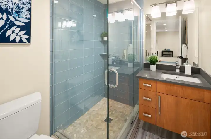 Downstairs bathroom.  I love the tile color...it's called "Seattle Blue".