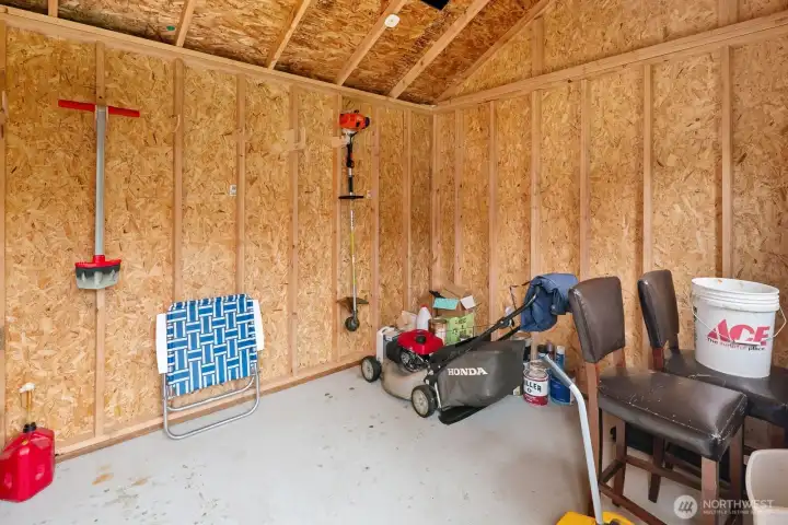 Inside the new shed....The perfect storage for the yard equipment.  Honda mower and Stihl trimmer stays with the home.