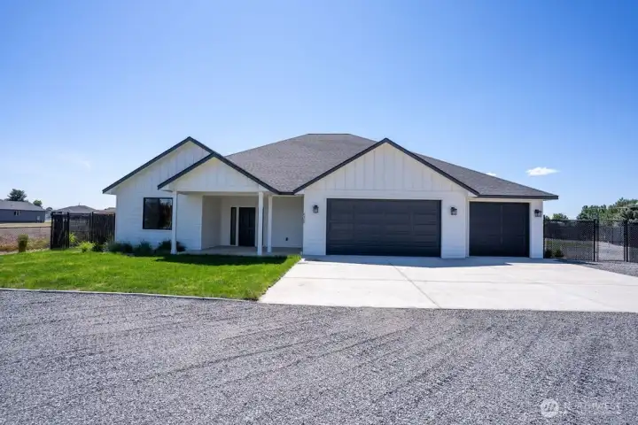 Welcome home! 1/2 acre, oversized 3 car garage and more!