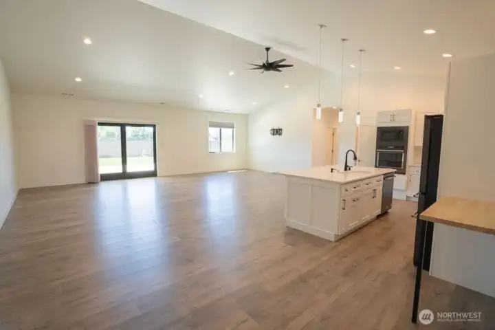 Open concept living, dining and kitchen