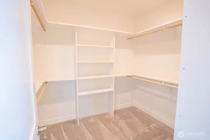 Full walk in closet in primary bedroom