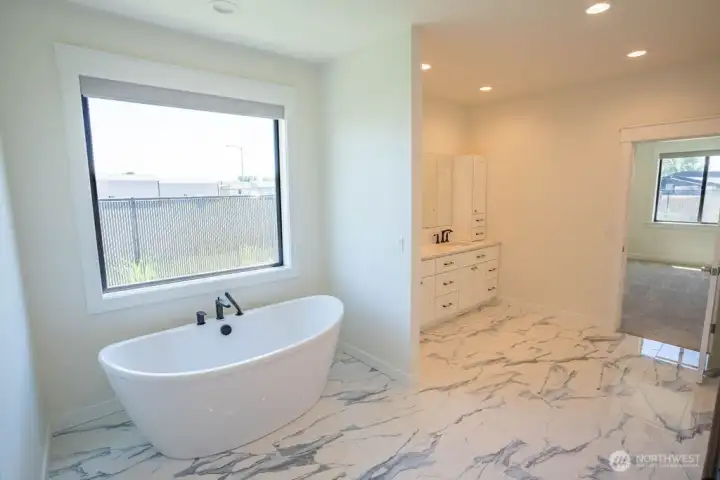 Soaker tub in the primary bathroom