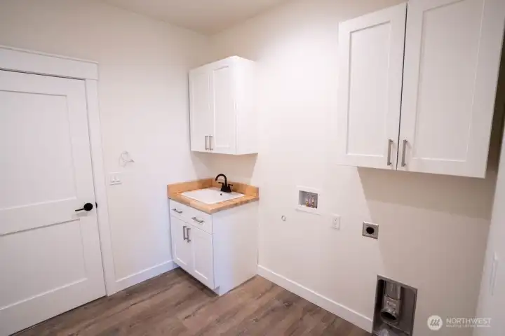 Large laundry/utility room with sink