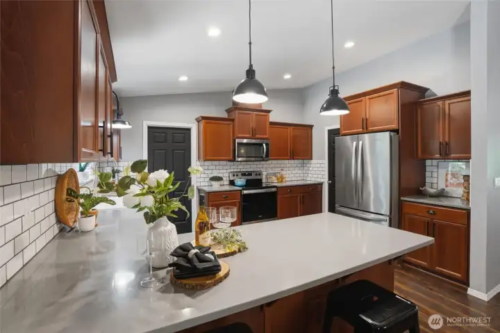 Kitchen with quartz countertops and modern finishes