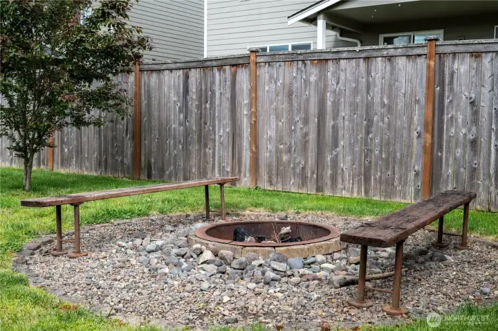 Custom backyard space with firepit