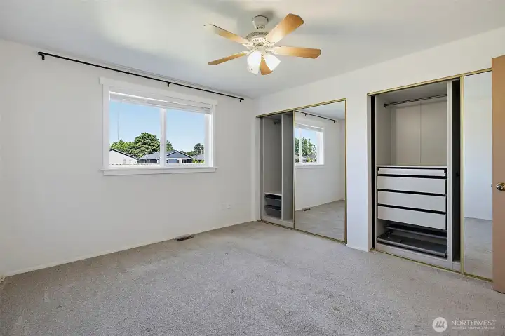 Nicely organized double closets in the primary suite.