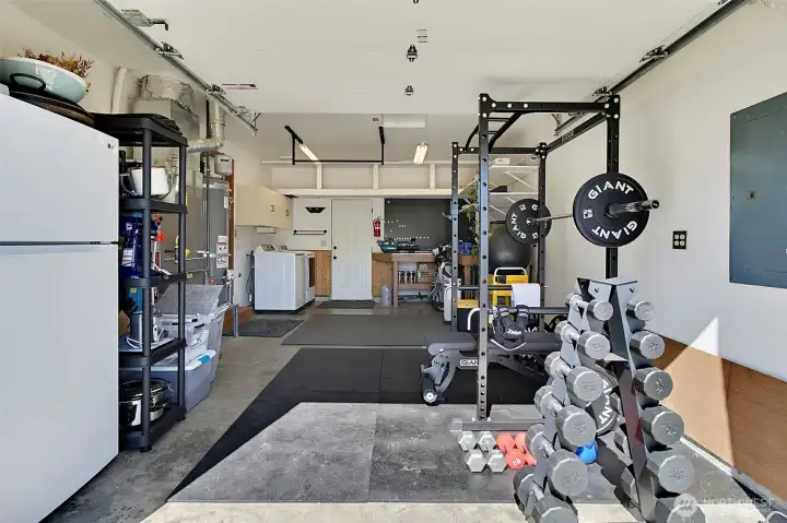 Well use of space in this single car garage with access door to the backyard.