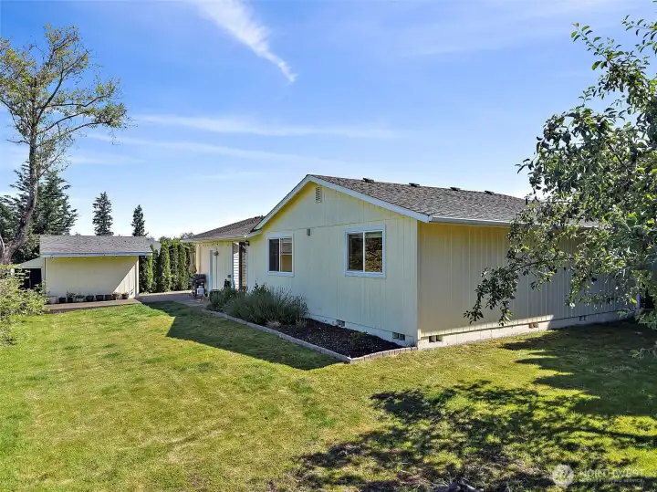 Almost 1/4 acre of level yard to play. This home offers a nice sized storage shed and fruit tree too.