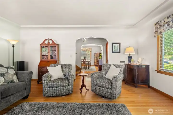 Framing the home’s timeless character, beautiful arched doorways add architectural elegance and a seamless, graceful flow between the living spaces. A stunning detail that truly elevates the room. Framing the home’s timeless character, beautiful arched doorways add architectural elegance and a seamless, graceful flow between the living spaces. A stunning detail that truly elevates the room.
