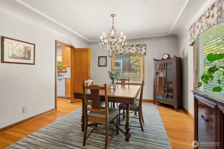 Flowing effortlessly from the living room, this lovely dining area continues the home’s warm and inviting theme. Flowing effortlessly from the living room, this lovely dining area continues the home’s warm and inviting theme.