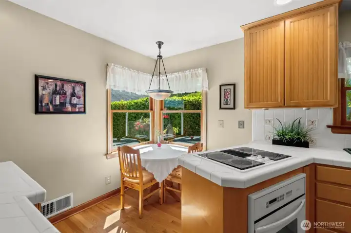 Where function meets charm. This designated eating space opens up the kitchen and makes gatherings that much more enjoyable. Where function meets charm. This designated eating space opens up the kitchen and makes gatherings that much more enjoyable.