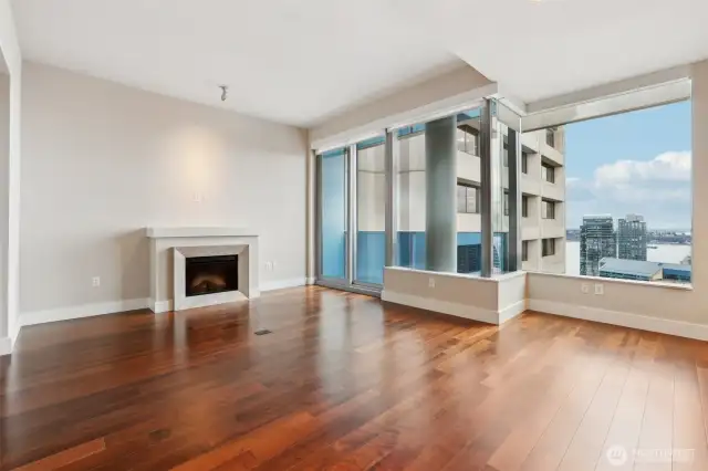 View of living & dining space from fridge.