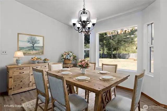 Dining area with great views to the fully fenced backyard.