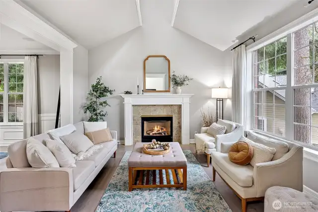 Gas fireplace with vaulted ceilings allow for extra light