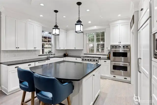 Beautiful kitchen opens to the family