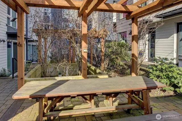 Community courtyard with lights and seating.