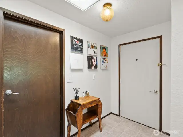 The two car garage opens into the entryway.