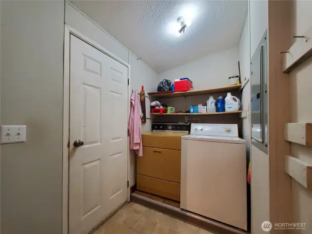Laundry room / Utility room and Backdoor.