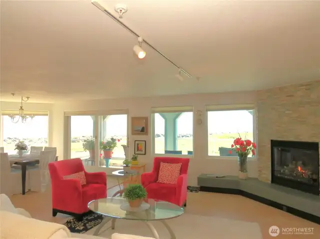 SECOND LEVEL HAS SWEEPING VIEWS OF THE OCEAN AND ROCK JETTY FROM THE OPEN CONCEPT LIVING AREA!