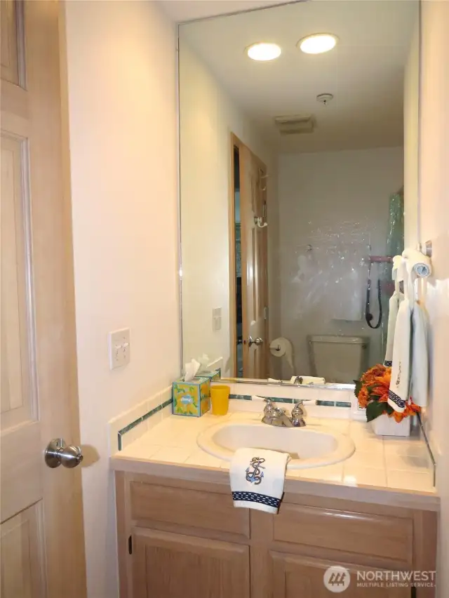 THE GUEST FULL BATH IS JUST AROUND THE CORNER!