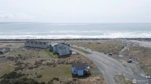 DRONE SIDE VIEW OF THE CONDO TOWARD THE WESTPORT JETTY!