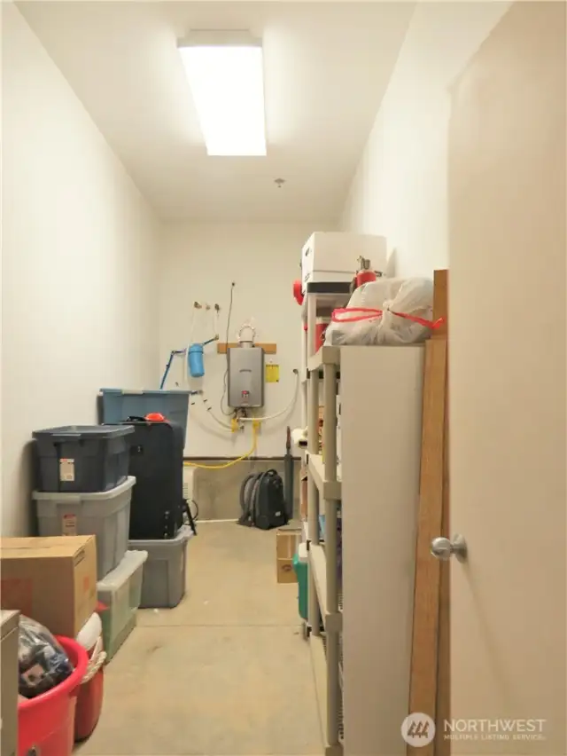 THERE IS A STORAGE ROOM IN THE BACK AREA OF THE CONDO'S GARAGE!