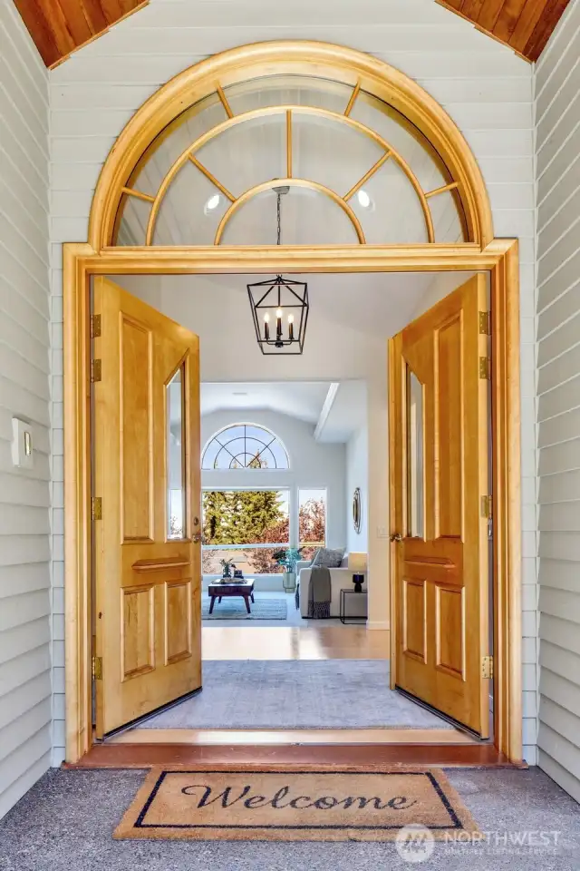 Note the custom wood double-entry doors