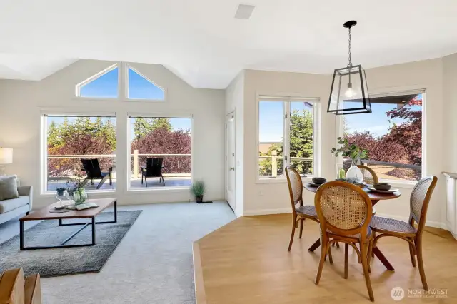 Another view of the kitchen eating area and family room