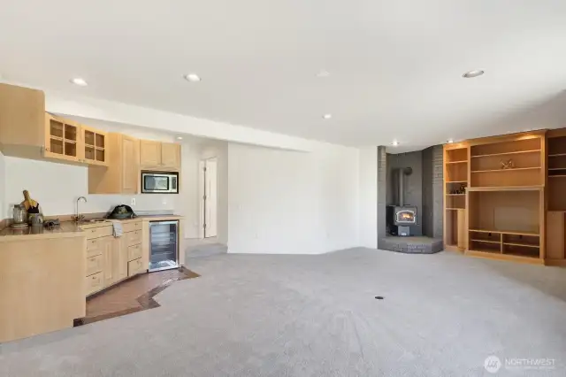 The lower level primary bedroom is large and has access to the backyard through the bathroom