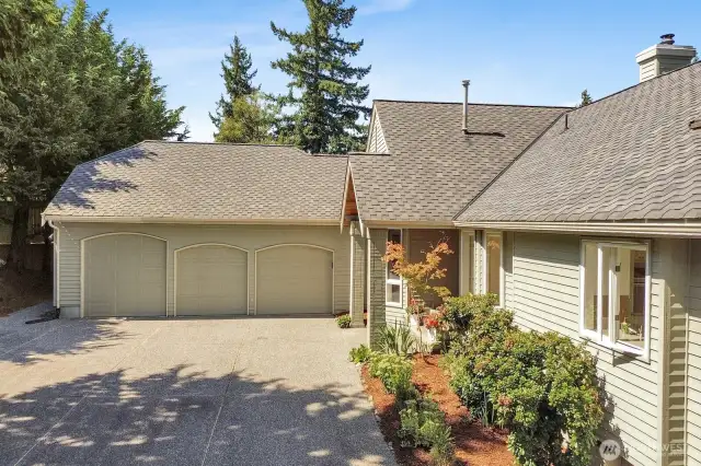 3-car garage with ample parking outside too