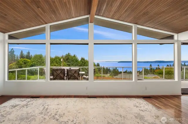 A gallery of windows framing the vistas.