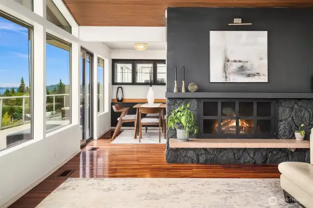 Striking accent wall with wood-burning fireplace.