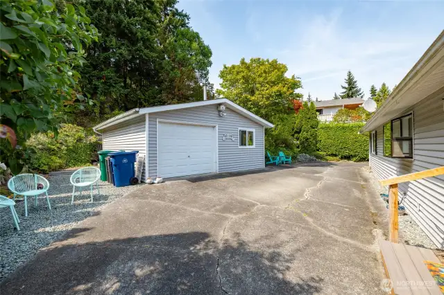Detached 1 car garage with 2 bonus rooms.
