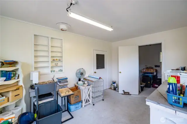 One of two bonus rooms in the garage. Artist studio, gardener, hobbyist, craftroom, tea room, the uses are endless!