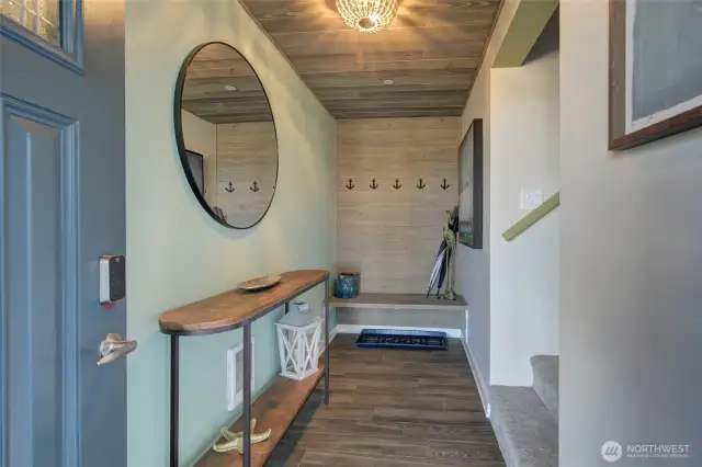 Unit A features an EV charger just outside.  Now, let's step inside Unit A - the upper unit.