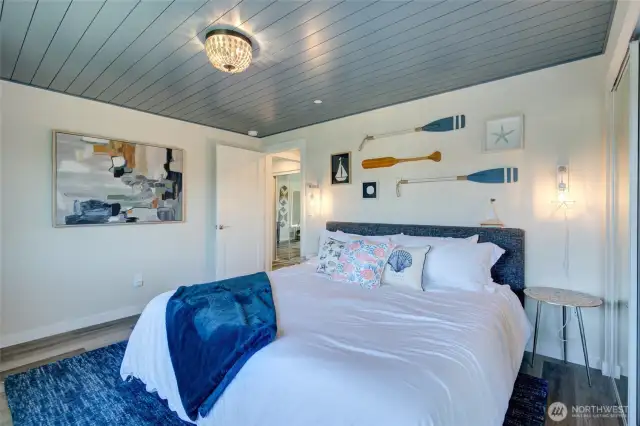 The second bedroom of Unit A is also comfortable appointed in a beach theme.