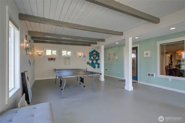Moving down to the main level, you enter Unit B in the Game Room!!!!