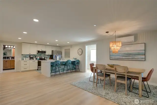 Stepping into Unit B from the game room, you walk into an open and airy great room.