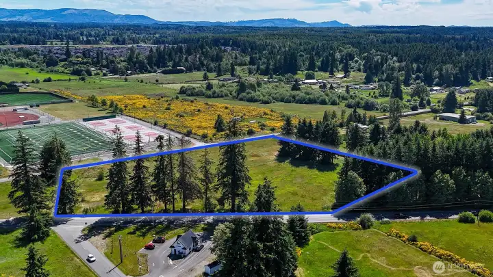 Well and septic (buyer to verify), and electricity is in the street. Blue lines are approximate, buyer to verify to own satisfaction.