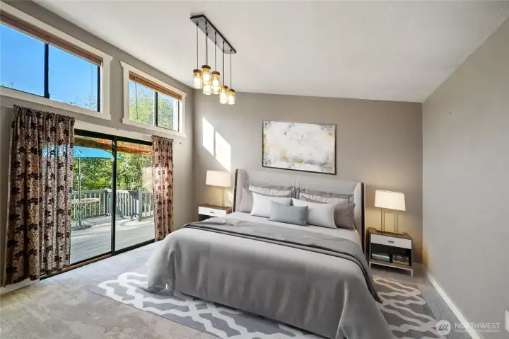 Primary bedroom with slider to deck.