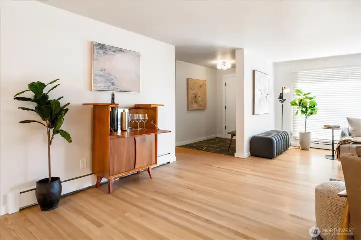 Spacious living room that opens to large dining room.