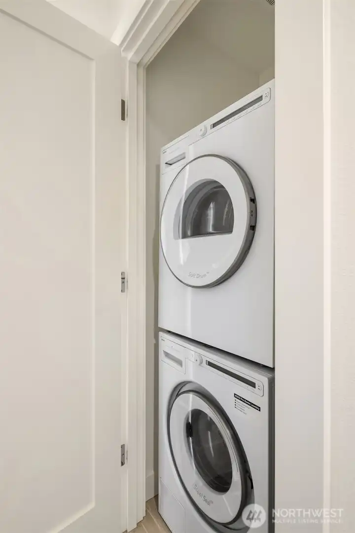 The washer and dryer are on the same level as the primary bedroom, for added convenience.