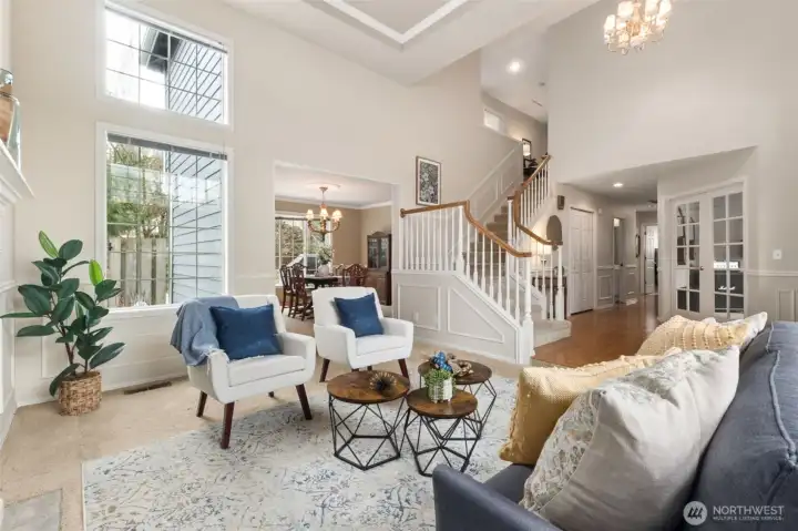 Another view shows the dining room in the center of the photo, just off the kitchen.