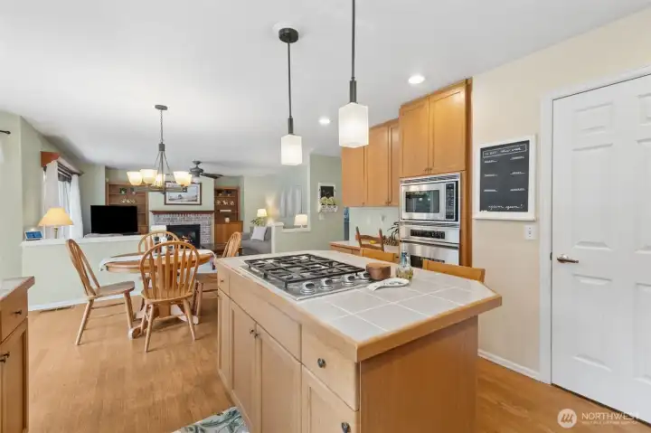 Looking this way you can see the door to the walk-in pantry on the right, and the dining area off the kitchen.