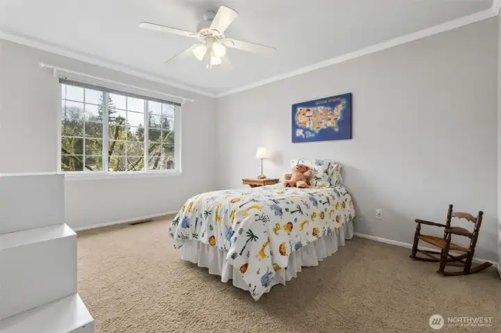 Bedroom #3, another big room with ceiling fan and closet.