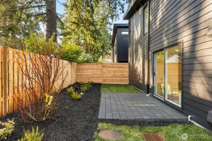 Continuing the theme of privacy, this home offers a fully fenced and landscaped backyard, perfect for pets, entertaining, or just enjoying the surrounding greenery