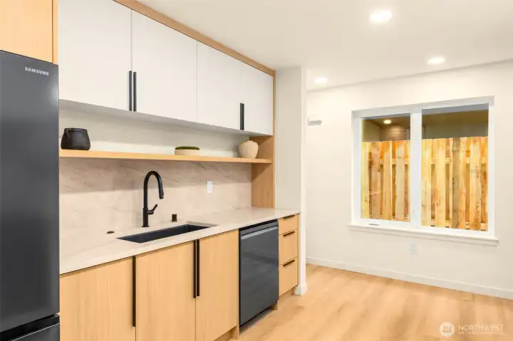 No shortcuts here - 3 cm quartz countertop with a custom undermount sink fit into the slab